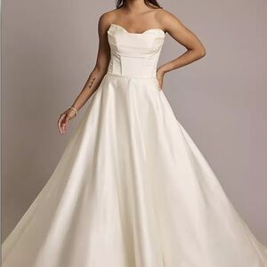 Ivory David's Bridal off-shoulder Wedding Gown